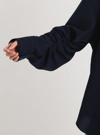 バックドロストシャツ