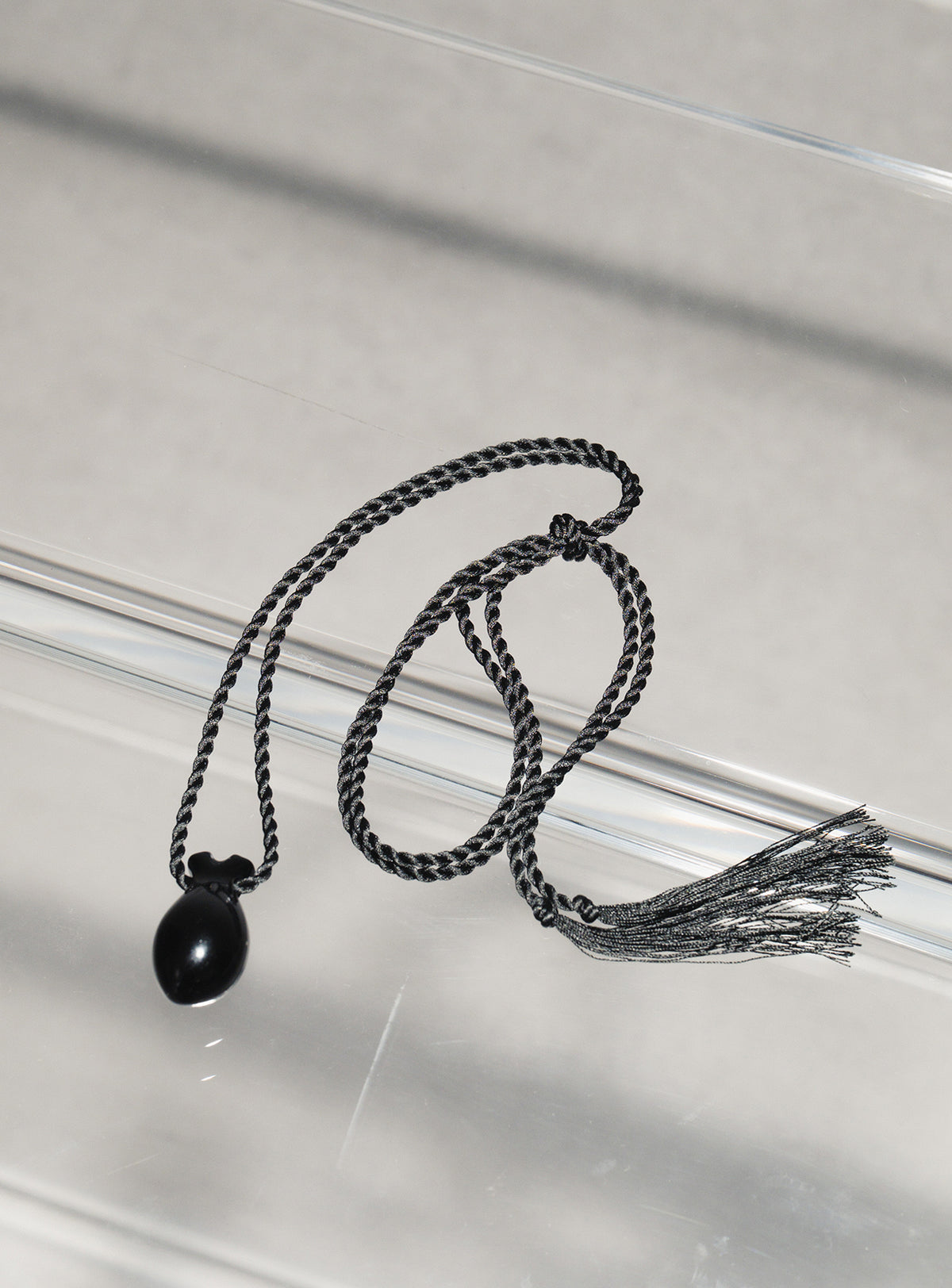 Onyx heart with silk cord