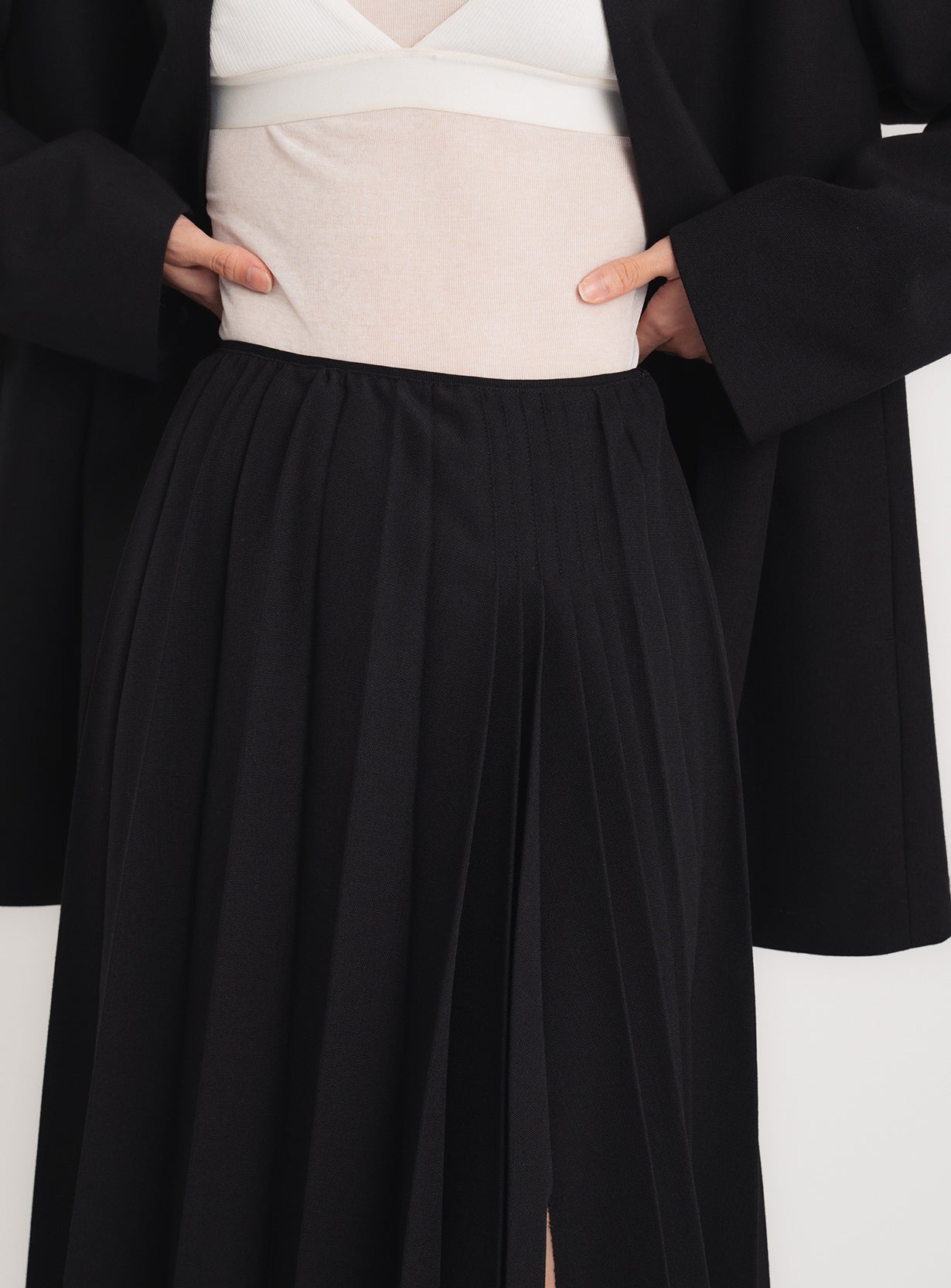 ラスティックプリーツスカート