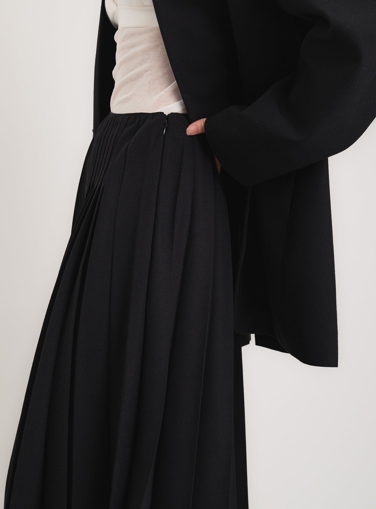 ラスティックプリーツスカート
