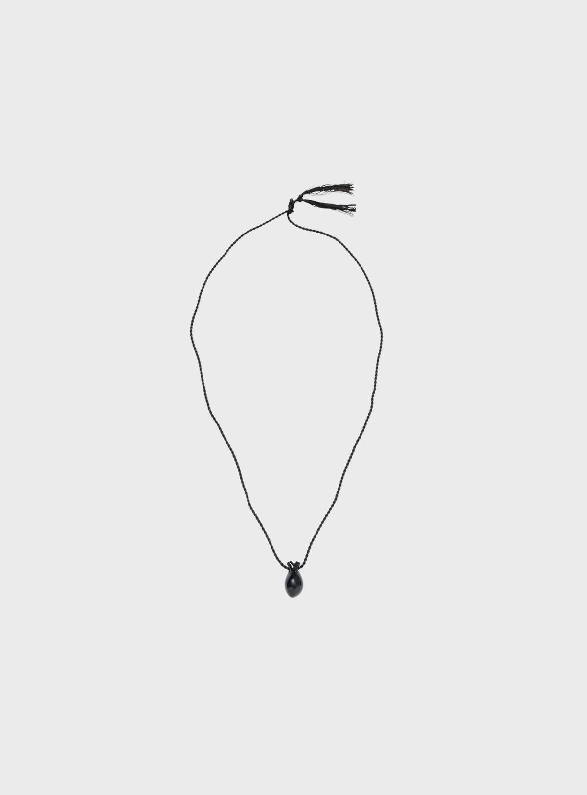 Onyx heart with silk cord